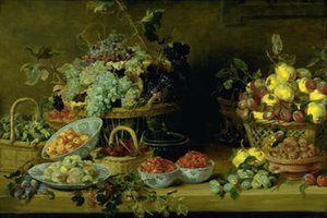 Stilleven met fruit op een tafel door Frans Snijders