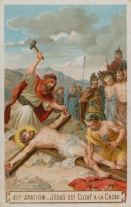 Kruisiging: Jezus wordt aan het kruis genageld. De elfde statie van de kruisweg