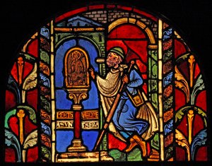 Een scène uit het leven van St. Nicolaas, ex Troyes Kathedraal: een lener heeft zijn geld verloren en gaat naar het standbeeld van St. Nicolaas, die over dergelijke zaken waakt