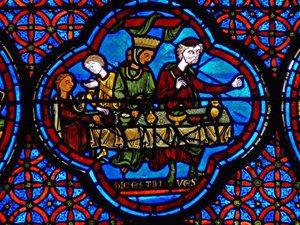 Detail uit een raam van de gelijkenis van Lazarus en de Rijke Man door French School