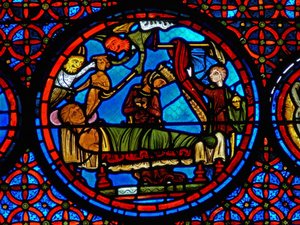 Detail uit een raam van de gelijkenis van Lazarus en de Rijke Man door French School