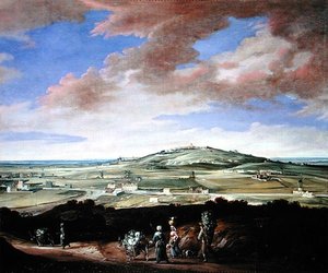Landschap met een stad op een heuvel