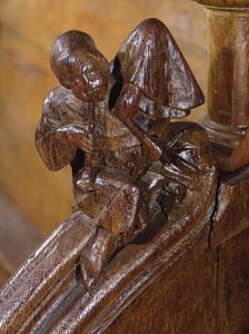 Muzikant die een dubbele fluit speelt, detail uit een koorbank, 14e-16e eeuw (hout)