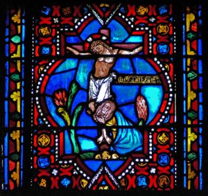 Raam n1-L met een scène uit het leven van St. Maria Magdalena - de heilige aan de voet van het kruis
