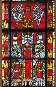 Raam met een kasteel en vlaggen met fleur-de-lis