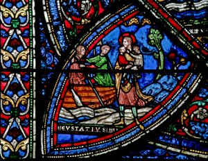 Raam w21 met een scène uit het leven van St. Eustache: de schipper neemt zijn vrouw