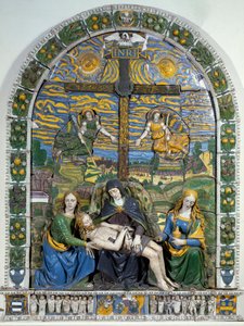 De Kruisafneming (Pieta) Jezus Christus en de Maagd Maria omringd door Sint Jan en Sint Maria Magdalena voor het kruis met de inscriptie INRI (I.N.R.I.). door Giovanni della Robbia