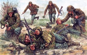 Tweede Wereldoorlog: soldaten van de Sturmtruppen, een elite-eenheid van het Duitse Keizerlijke Leger, een van hen knipt prikkeldraad door