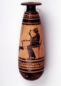Schilderij op vaas: albasten gebruikt om het parfum te bevatten: een zijde toont een vrouw die met een hinde speelt en een bloem vasthoudt. Haar mand om de wol te houden is achter haar. 500 v.Chr. BNF, Medaille Kantoor