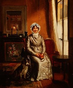 Een dame met een hond in een interieur