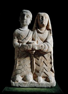 Iberische kunst: beeldje van een paar dat een offer brengt. Beeldhouwwerk uit Albacete, Cerro de los Santos, Spanje. 4e-2e eeuw v.Chr. Madrid, Nationaal Archeologisch Museum