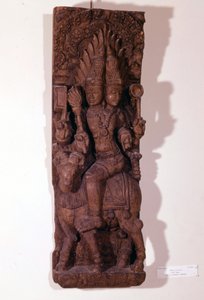 Agni, god van het vuur, afgebeeld met twee hoofden (bicefaal) op een ram, volgens de hindoeïstische mythologie. Houten sculptuur uit de 17e eeuw. Parijs, Musée Guimet. door Indian School