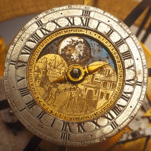 Wijzerplaat detail van hemelse klokwerk globe