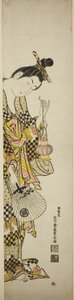 Een courtisane met een lantaarn en een waaier door Ishikawa Toyonobu