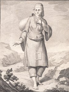 Een Arabische vrouw haalt water