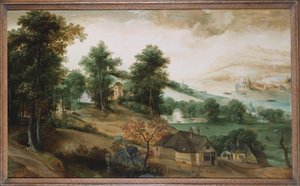 Een uitgestrekt landschap met huisjes op de voorgrond