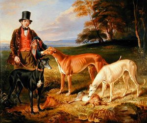 Thomas Harris, kennel-man van Tom Llewelyn Brewer, met windhonden