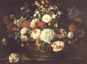 Pioenen, tulpen, narcissen en andere bloemen in een mand