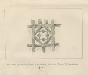 Steen - Sierpaneel op een oud huis: sepia was tekening