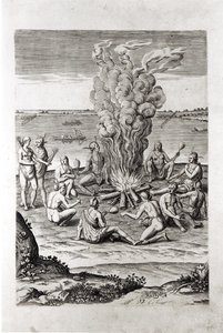 Indianen bidden rond een vuur, gravure uit Hariot