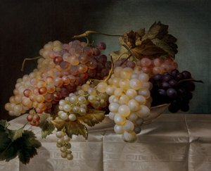 Stilleven met druiven in een porseleinen schaal