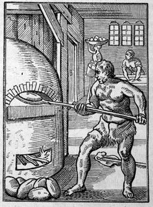 Een bakker die brood bakt in een oven. Gravure door Jost Amman (1539-1591) 16e eeuw. door Jost Amman