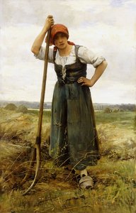 Boerin leunend op een hooivork