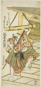 De acteur Bando Hikosaburo II als Fujitaro, vermomd als de veerman Tomokichi, in het stuk 