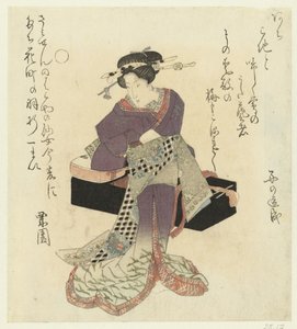 Geisha bindt haar ceintuur om