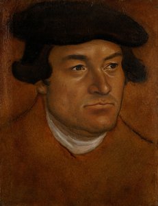 Portret van een man met een zwarte pet