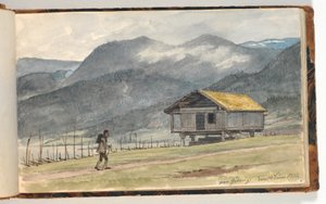 Berglandschap met hut en wandelaar