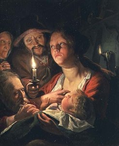 Moeder en Kind bij Kaarslicht