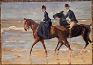 Ruiter en ruiter op het strand