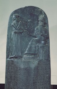 Reliëfbeeld van de zonnegod Shamash die zijn wetten dicteert aan koning Hammurabi op zijn beroemde wetboek, Oud-Babylonische periode, 1760 v.Chr. door Mesopotamian