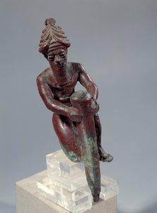 Mesopotamië: koperen funderingsfiguur die de god toont die een spijker duwt door Mesopotamian Mesopotamian