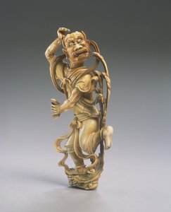 Een figuur van Kui xing