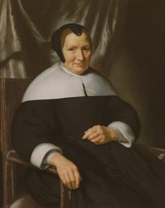 Portret van een dame zittend in een leunstoel door Nicolaes Maes