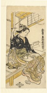 Vrouw met handspiegel door Okumura Toshinobu