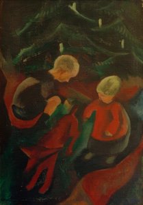 Twee kinderen onder de kerstboom