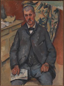 Portret van een zittende man