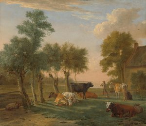 Koeien in een weiland bij een boerderij