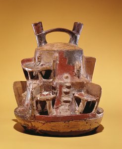 Aardewerk vat met huizen genesteld in de Andes