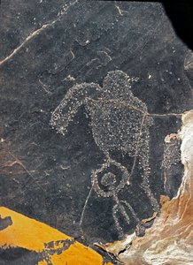 Prehistorie, rotstekeningen: een grafrots van een menselijke figuur. Steentijd 5000-2000 v.Chr. Taghit, Haut plateau du Hoggar (Ahaggar), Algerije door Prehistoric Prehistoric