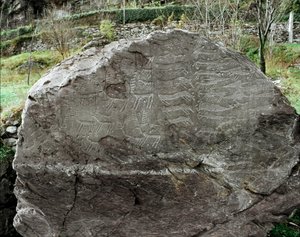 Prehistorie, rotstekeningen: grafrots met afbeeldingen van herten, vee en dolken. Kopertijd. Eneolithische periode (chalcolithicum). Roche nr. 1. Cemmo (Brescia) Parco archeologico nazionale dei Massi di Cemmo, Italië