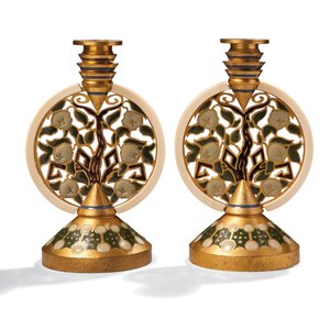 Een paar vergulde bronzen emaille en ivoren kandelaars, ca. 1907