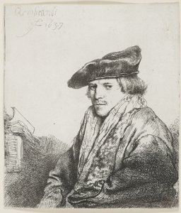 Jonge man met een fluwelen pet en boeken naast hem door Rembrandt van Rijn