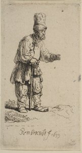Een boer met een hoge pet, staand leunend op een stok, 1639 door Rembrandt van Rijn