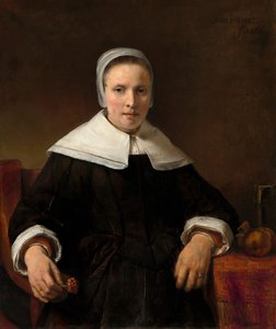 Een vrouw die een anjer vasthoudt, 1656 door Rembrandt van Rijn