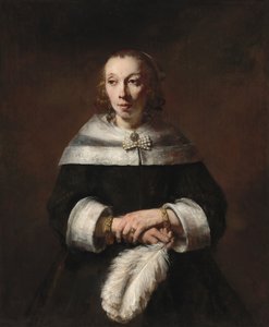 Portret van een dame met een struisvogelveren waaier door Rembrandt van Rijn