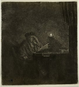Student aan een tafel bij kaarslicht door Rembrandt van Rijn